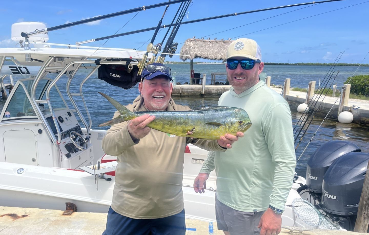 Two anglers fishing in an unknown location