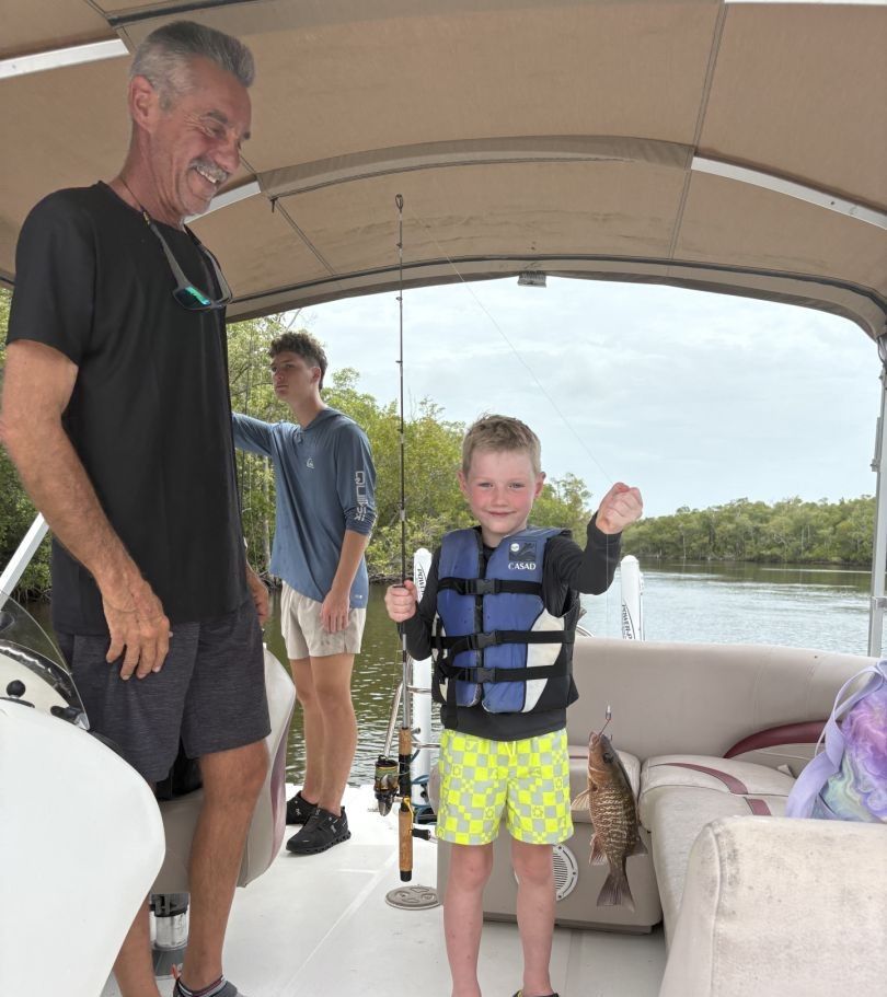 Three anglers fishing in an unknown location