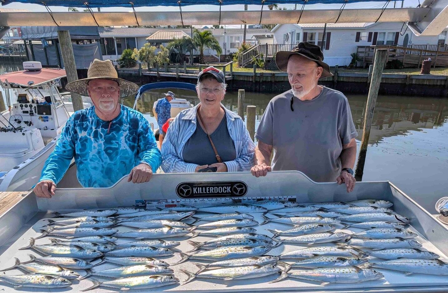 Four anglers fishing at an unknown location