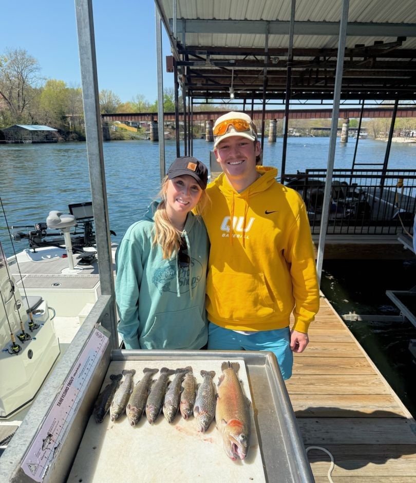 Two anglers fishing in an unknown location