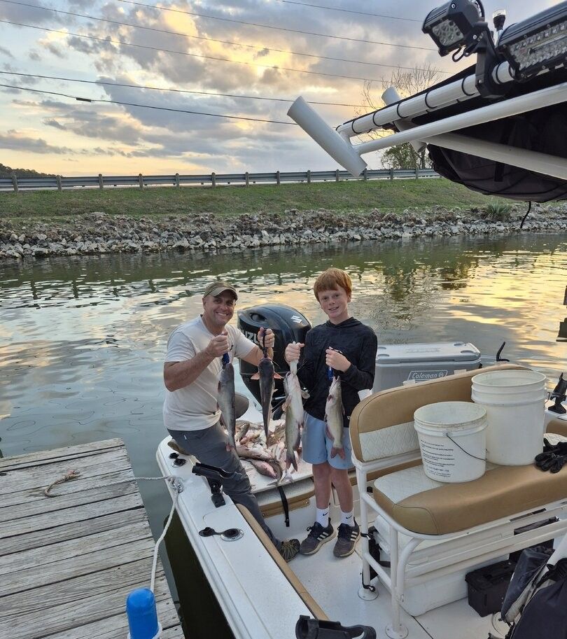 Two anglers fishing at unknown location