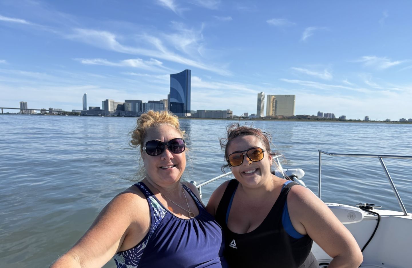 Two people fishing at an unknown location