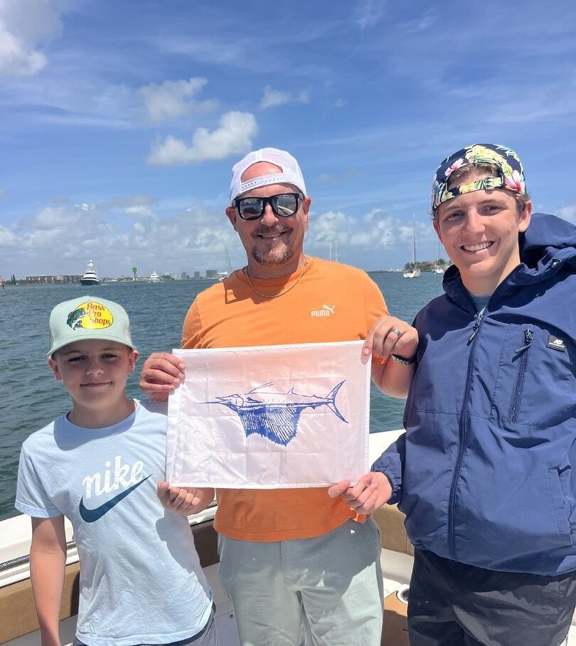 Atlantic sailfish fishing trip with caught fish display on boat