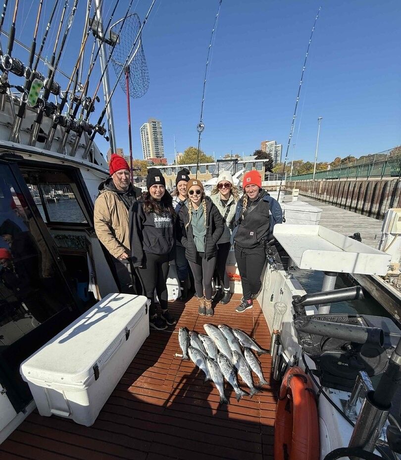 Six people fishing in a scenic location