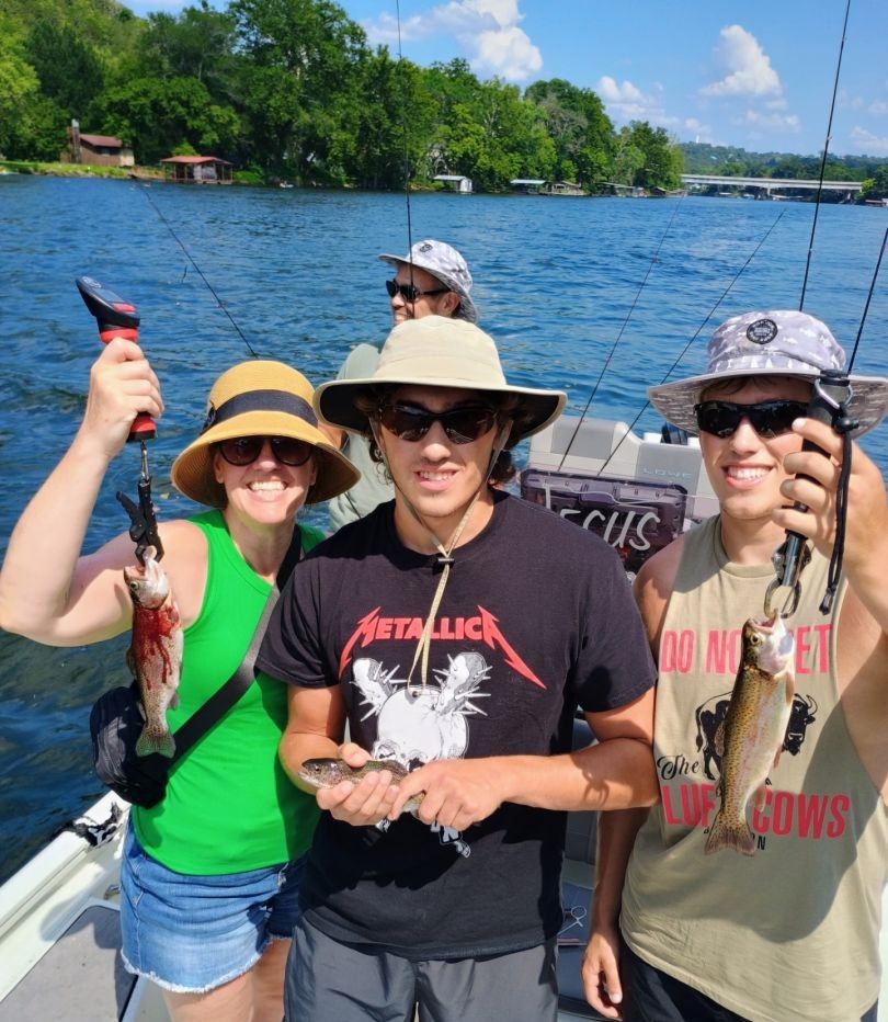 Two rainbow trout caught while fishing in an unknown location