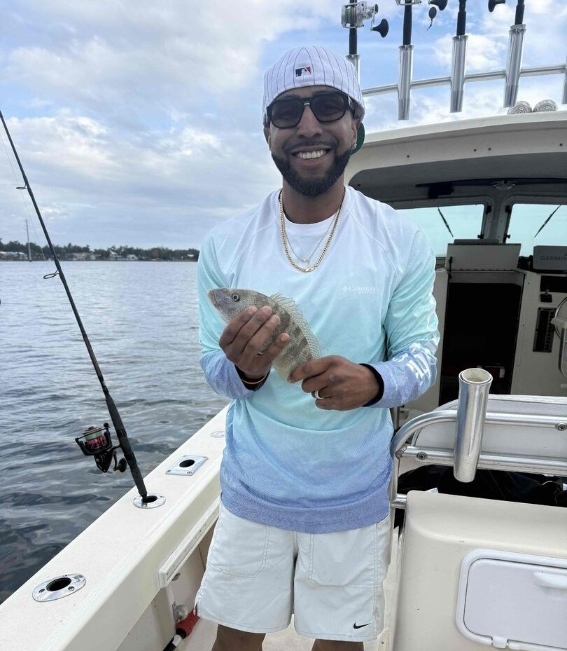 Lone angler fishing at unknown location