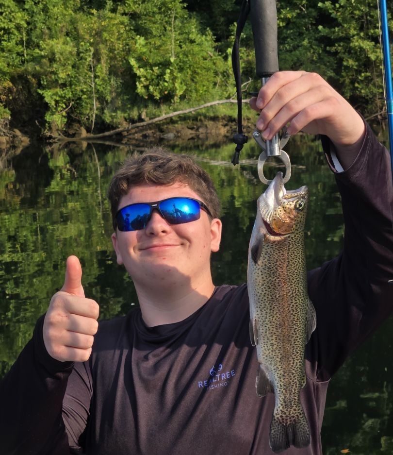 Photograph of a rainbow trout caught while fishing