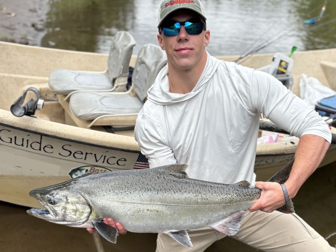 Coho salmon fishing in an unknown location