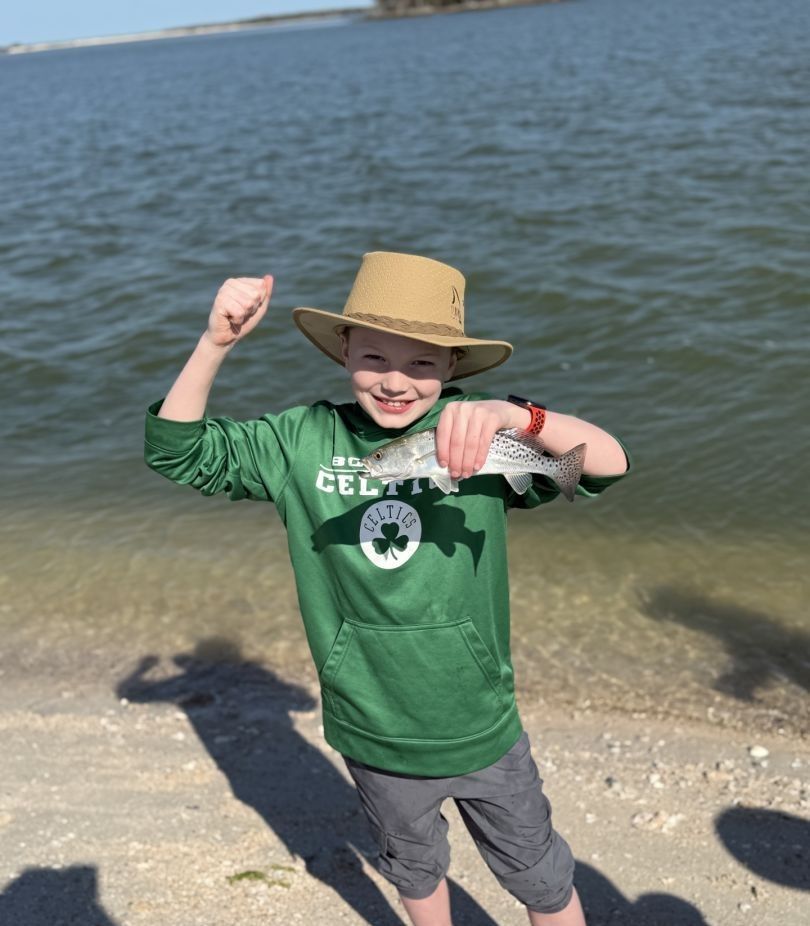 Angler enjoying a day of fishing in an unknown location
