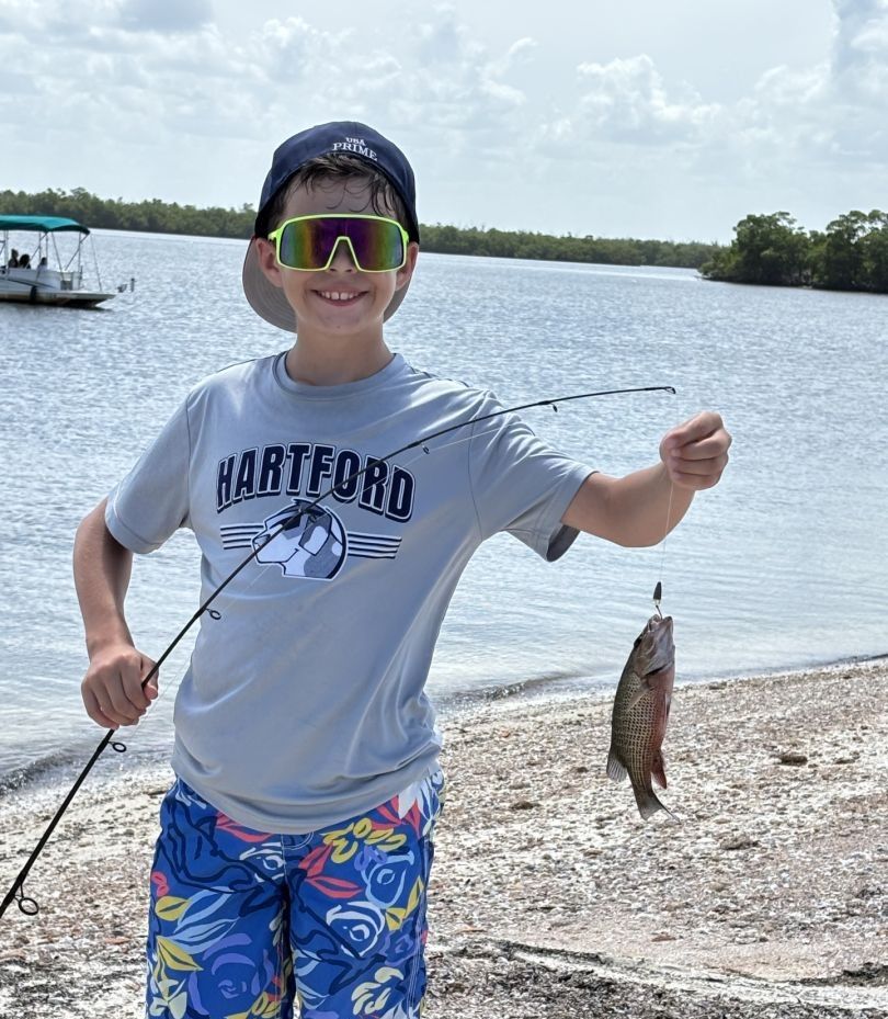 Person fishing in an unknown location