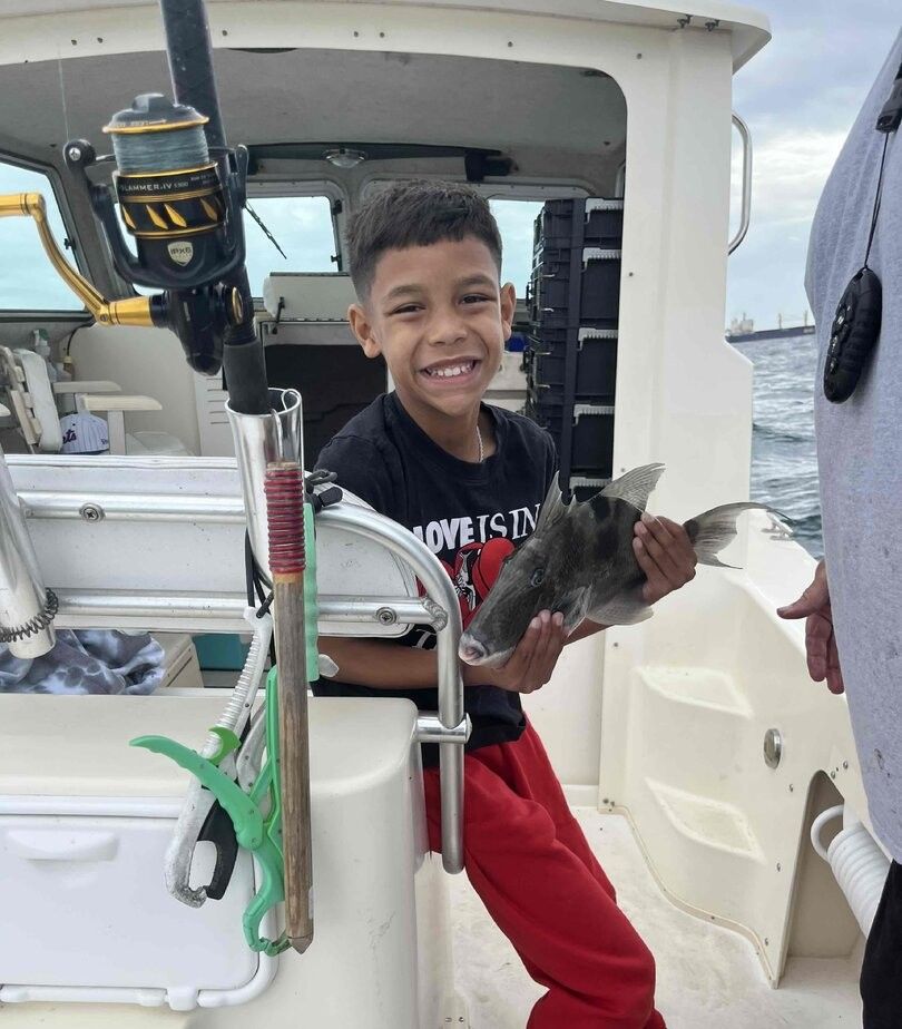 Angler fishing with rod in unknown location