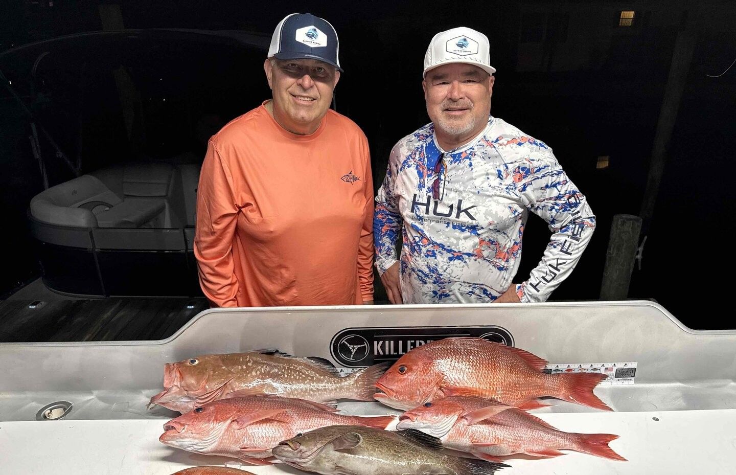 Two people fishing in a scenic location