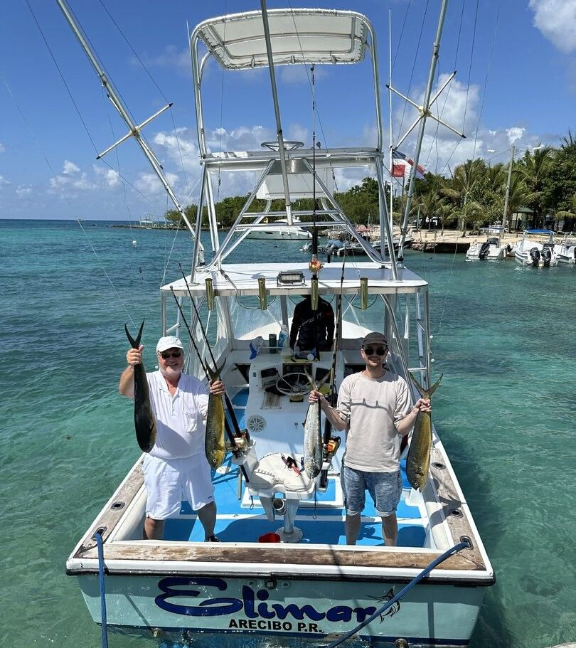 Two people fishing in unknown location