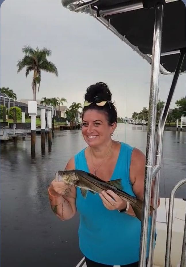 Person fishing in unknown location