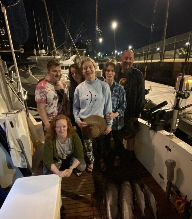Group of 6 people enjoying a fishing trip