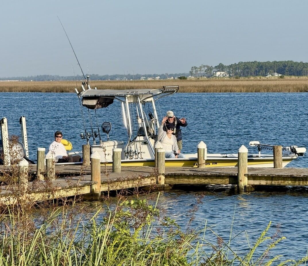 Two people enjoying a fishing trip