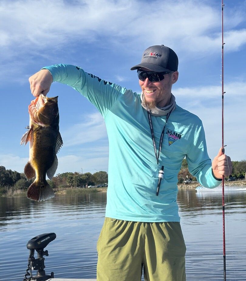 A person fishing in an unknown location