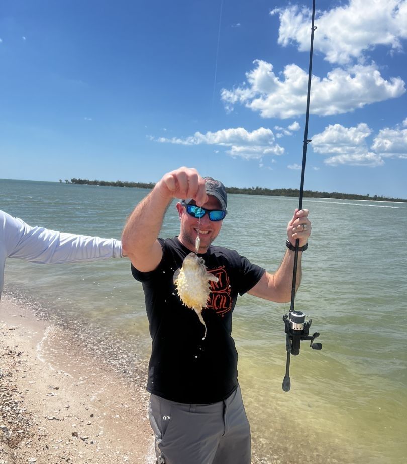 Lone angler fishing in unknown location
