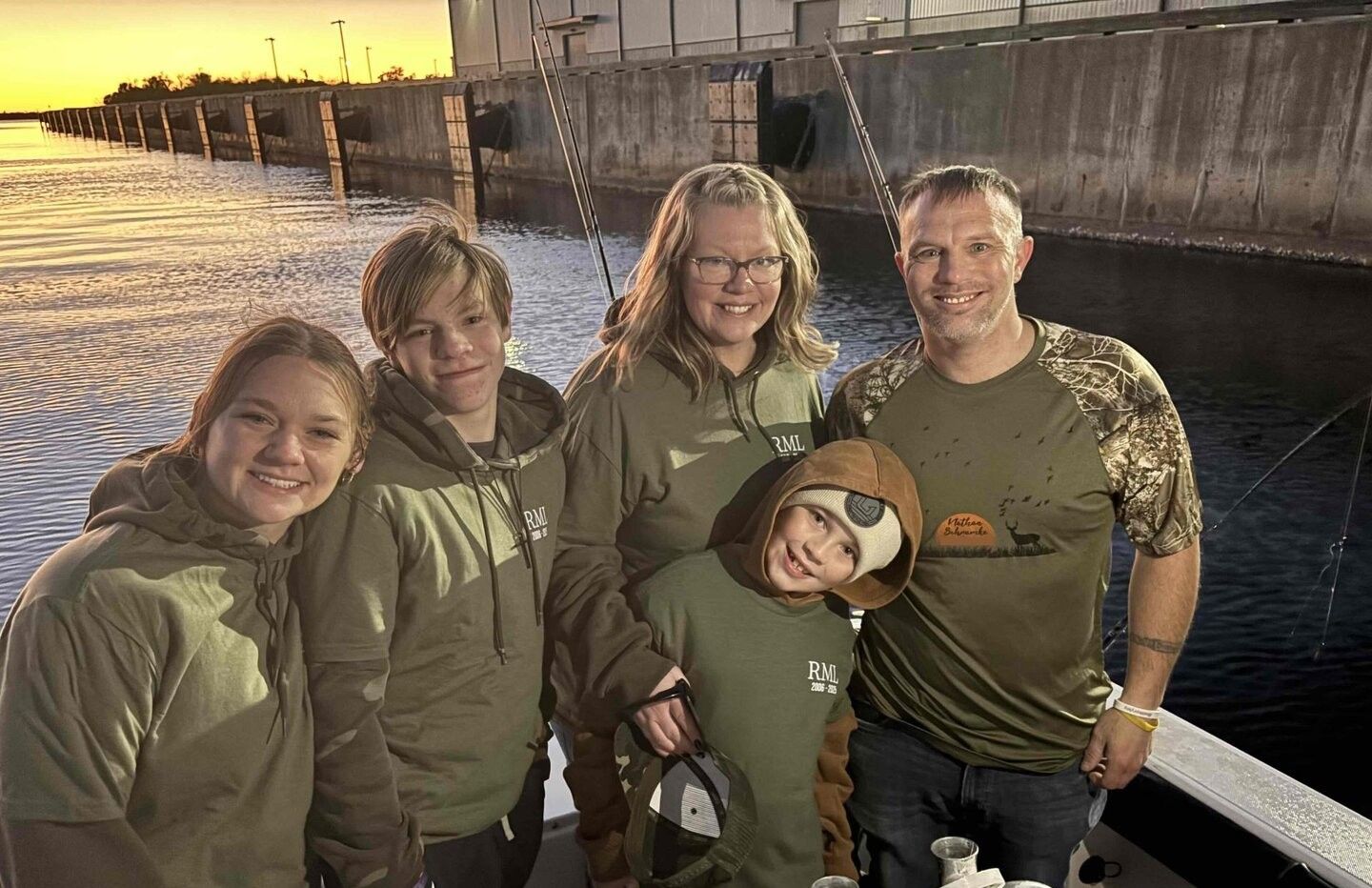 Group of 5 people fishing at a scenic location