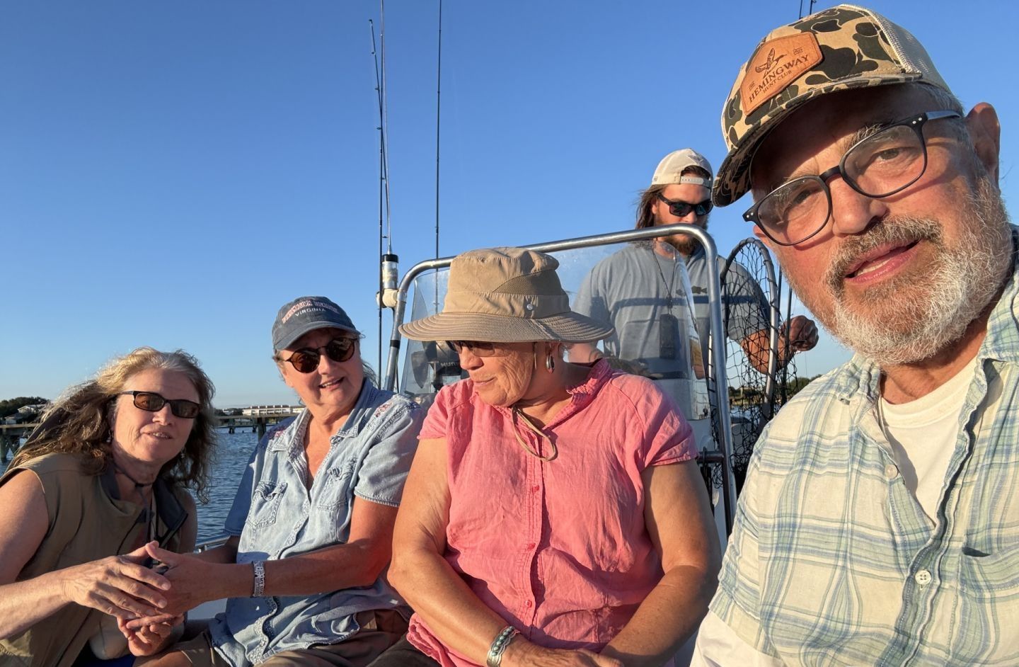 Five friends enjoying a fishing adventure