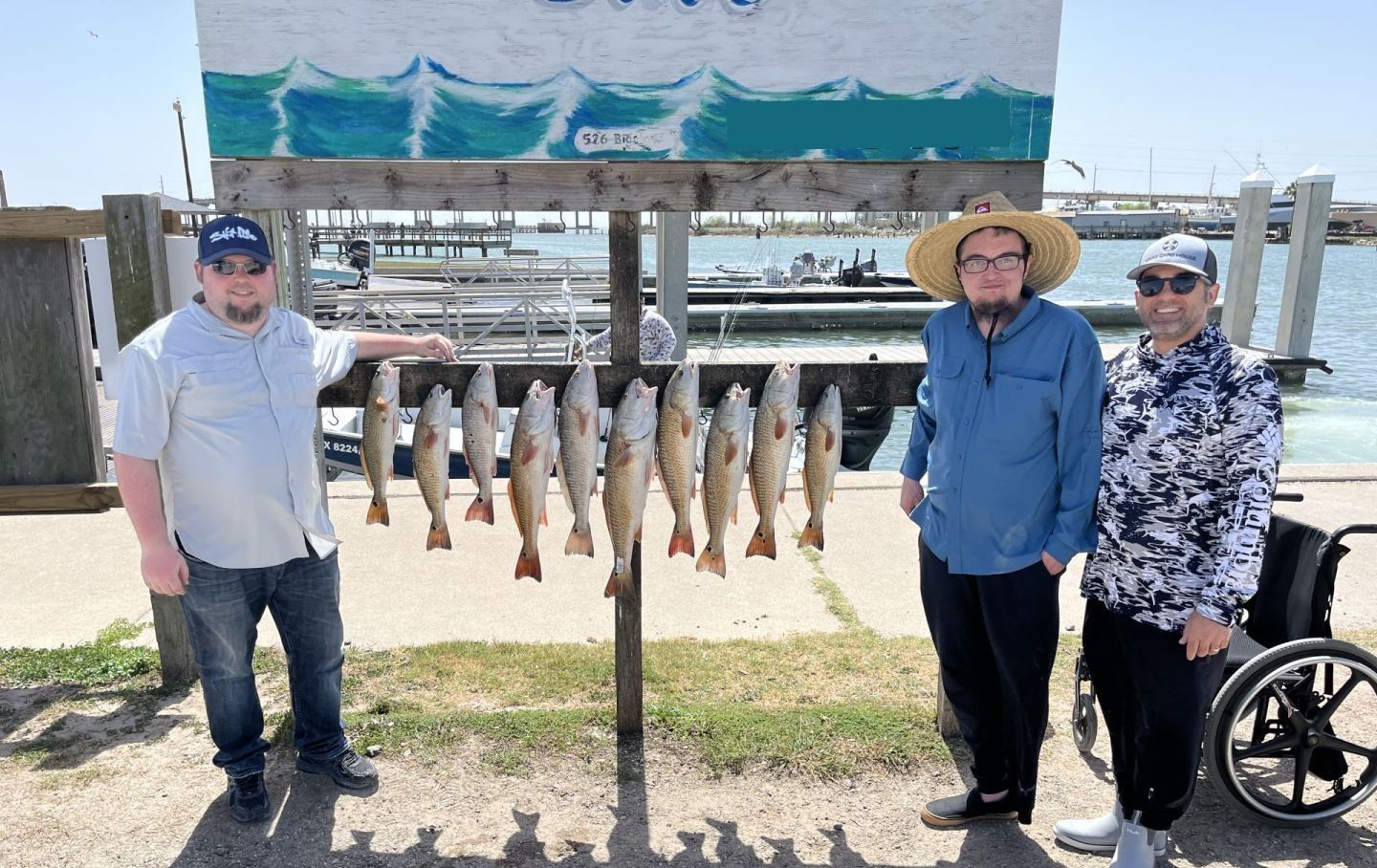3 people fishing at an unknown location