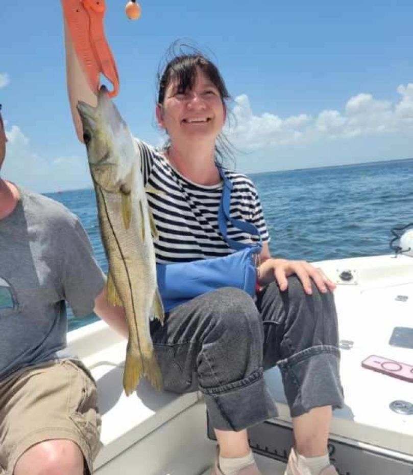A person fishing on the water