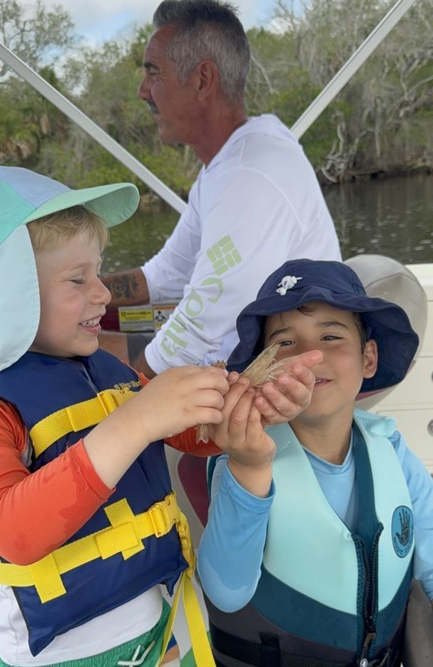 Three people fishing in an unknown location