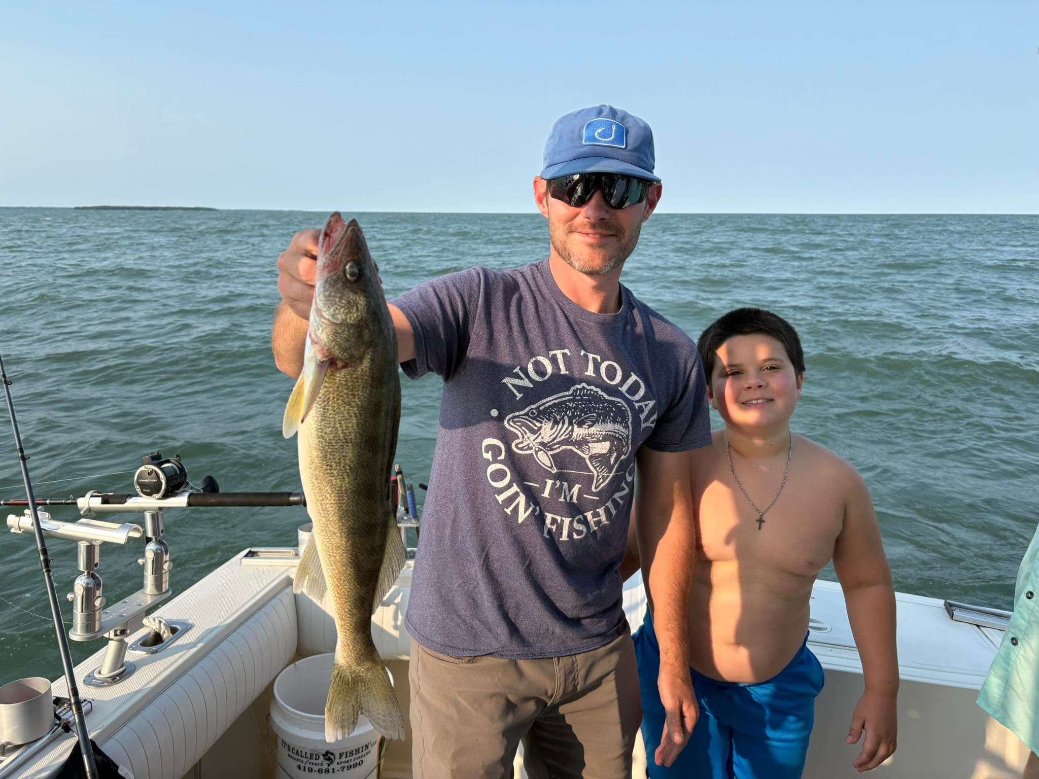 Two anglers enjoying a fishing trip at an undisclosed location