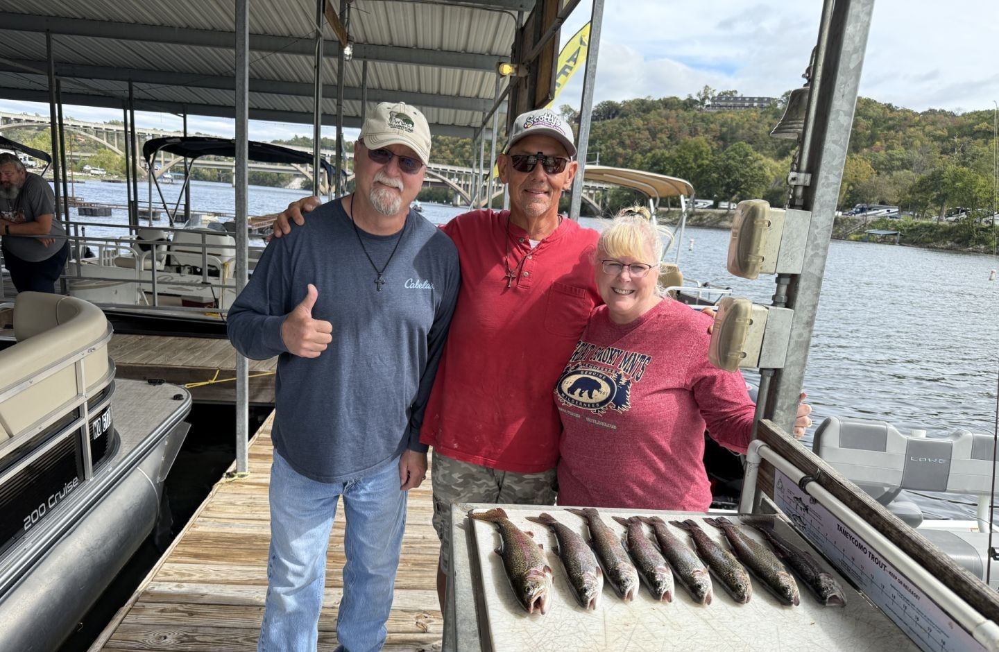 Four anglers fishing in a scenic location