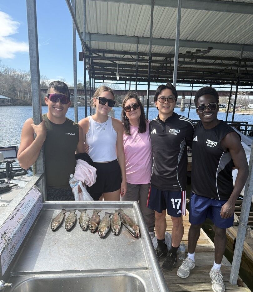 Fresh caught fish displayed on cleaning station at marina dock