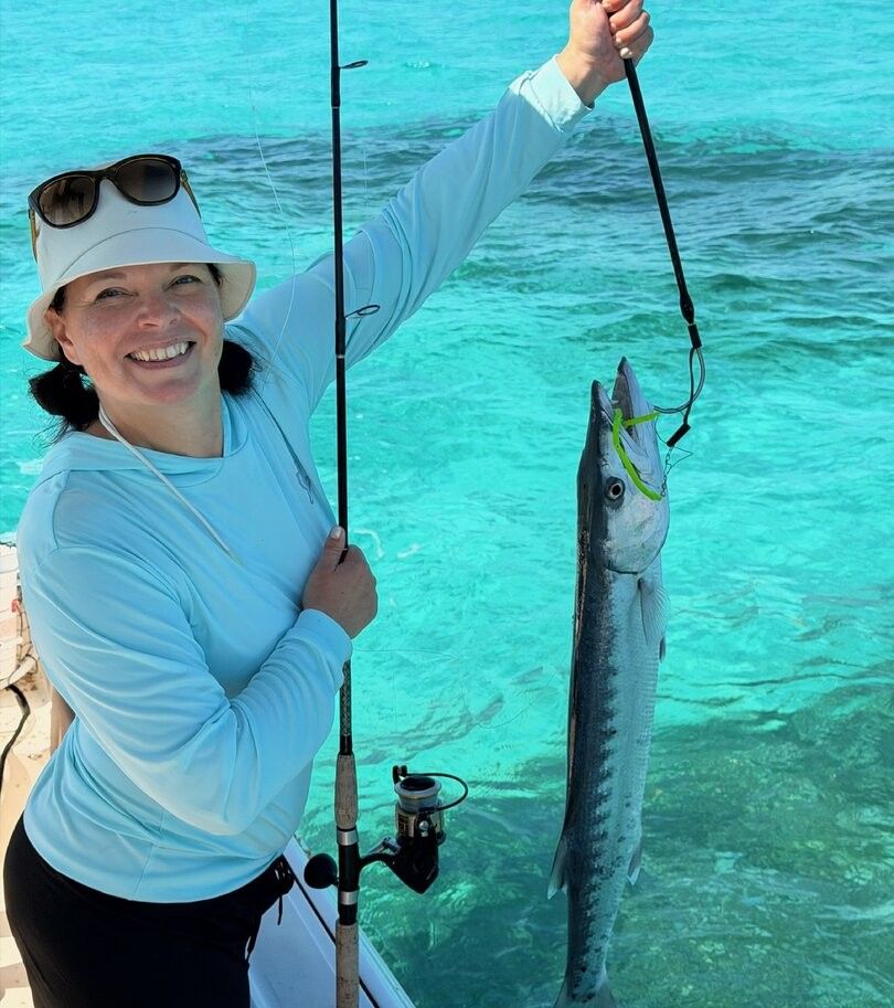 Great barracuda caught while fishing in clear turquoise waters
