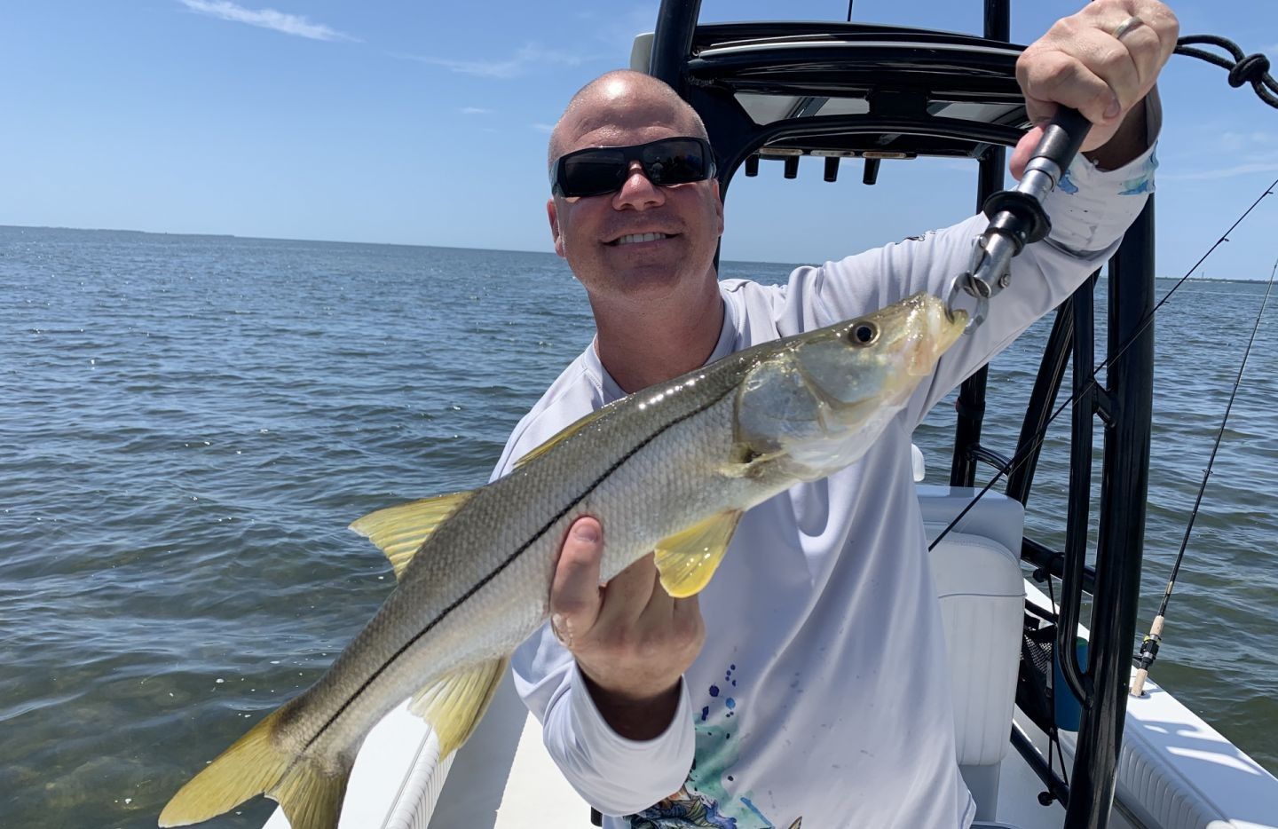 Photograph of a large snook fish caught while fishing