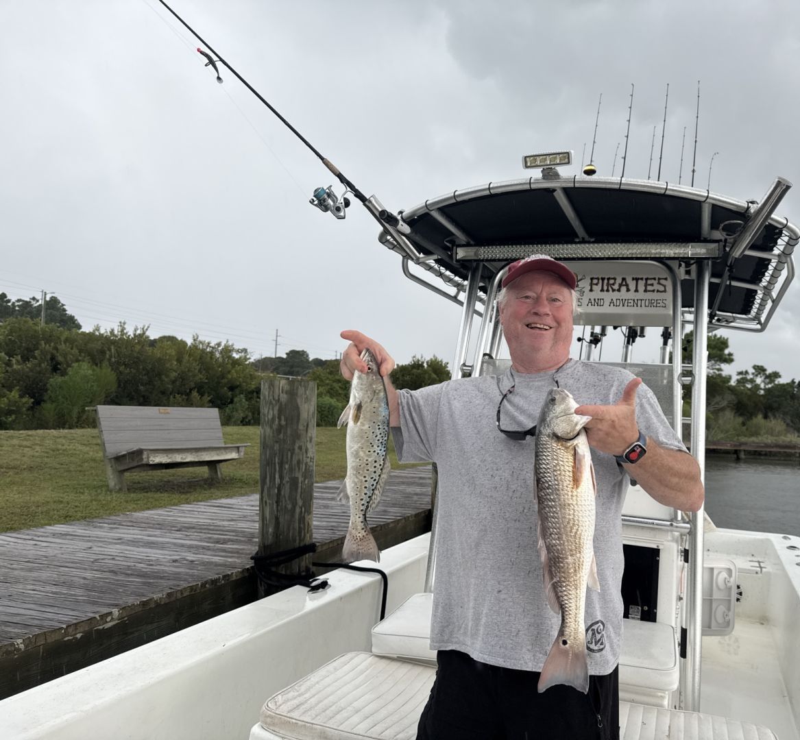 Two redfish and spotted weakfish caught while fishing
