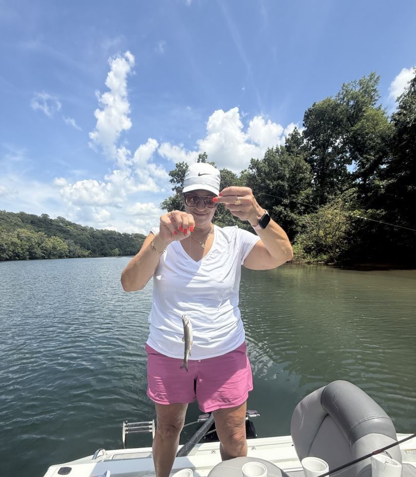 Angler fishing in scenic location