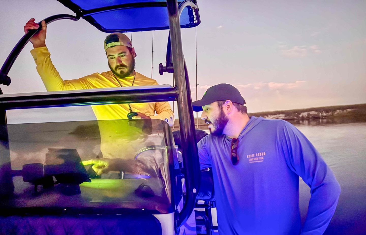 Two people fishing in a scenic location