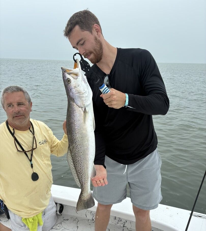 Large speckled trout caught during fishing trip on boat