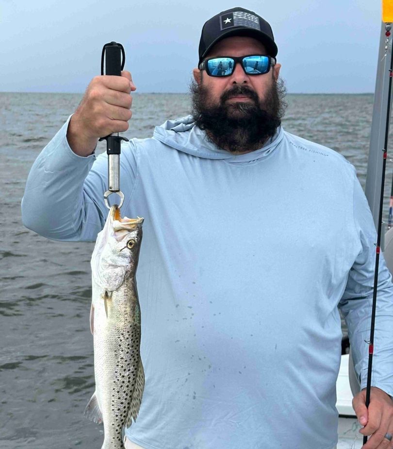 Photograph of a spotted weakfish caught on a fishing trip