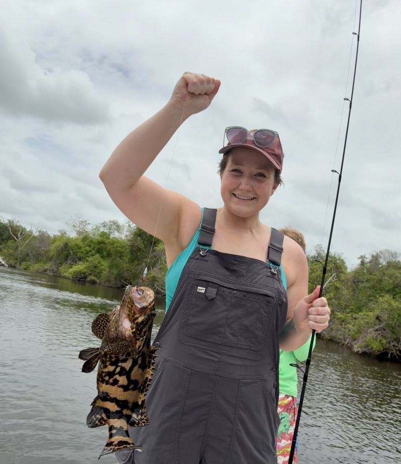 Lone angler fishing in unknown location