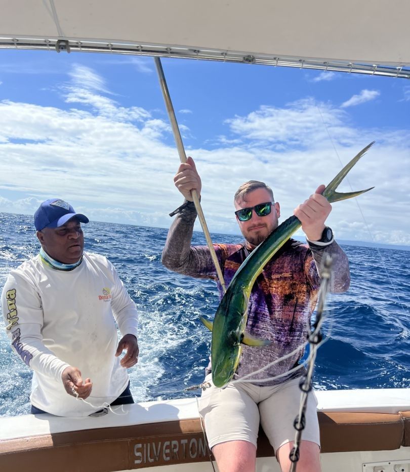 Two anglers fishing in a scenic location