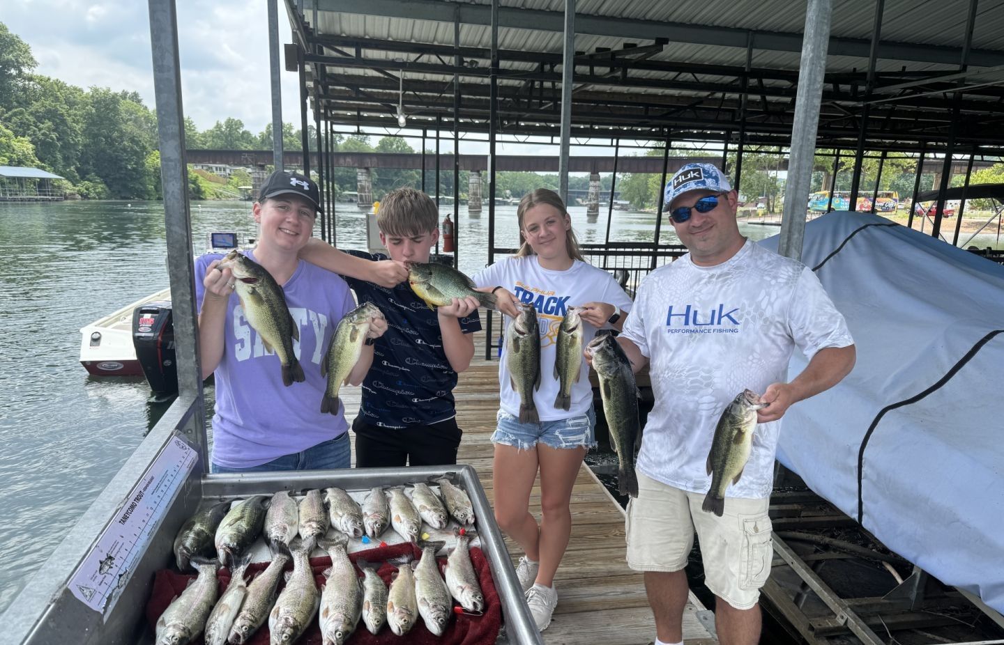 Four anglers fishing in an unknown location