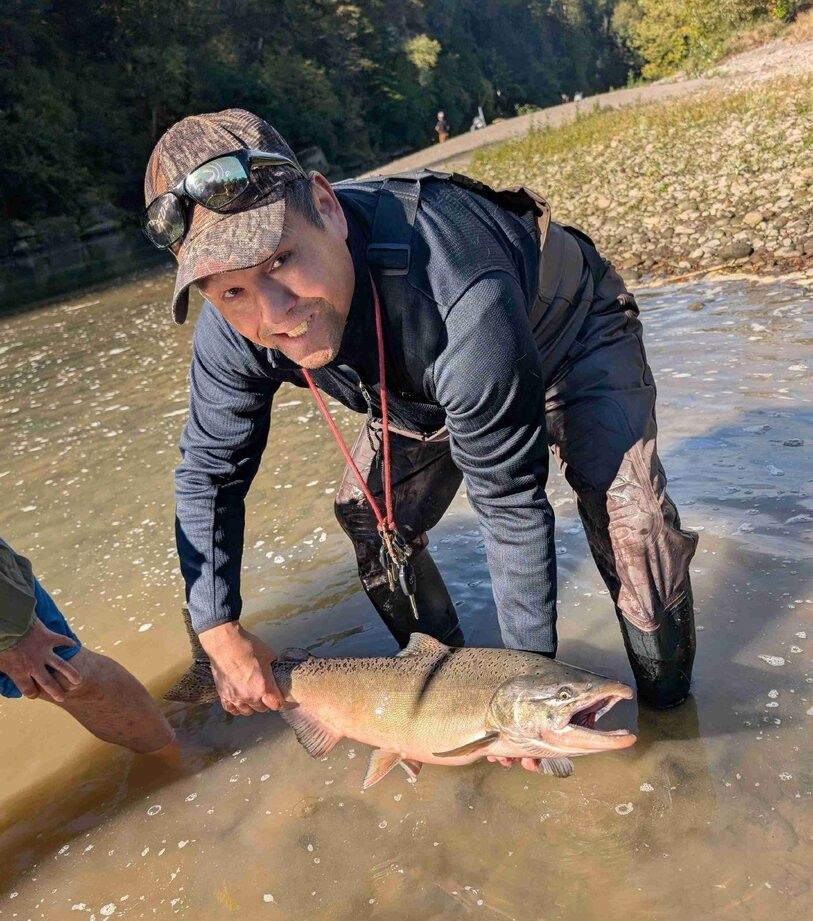 Person fishing at unknown location