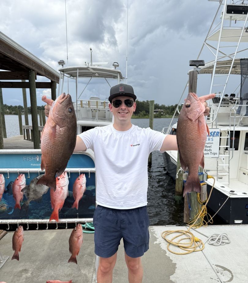 Angler fishing in unknown location with 3 fish