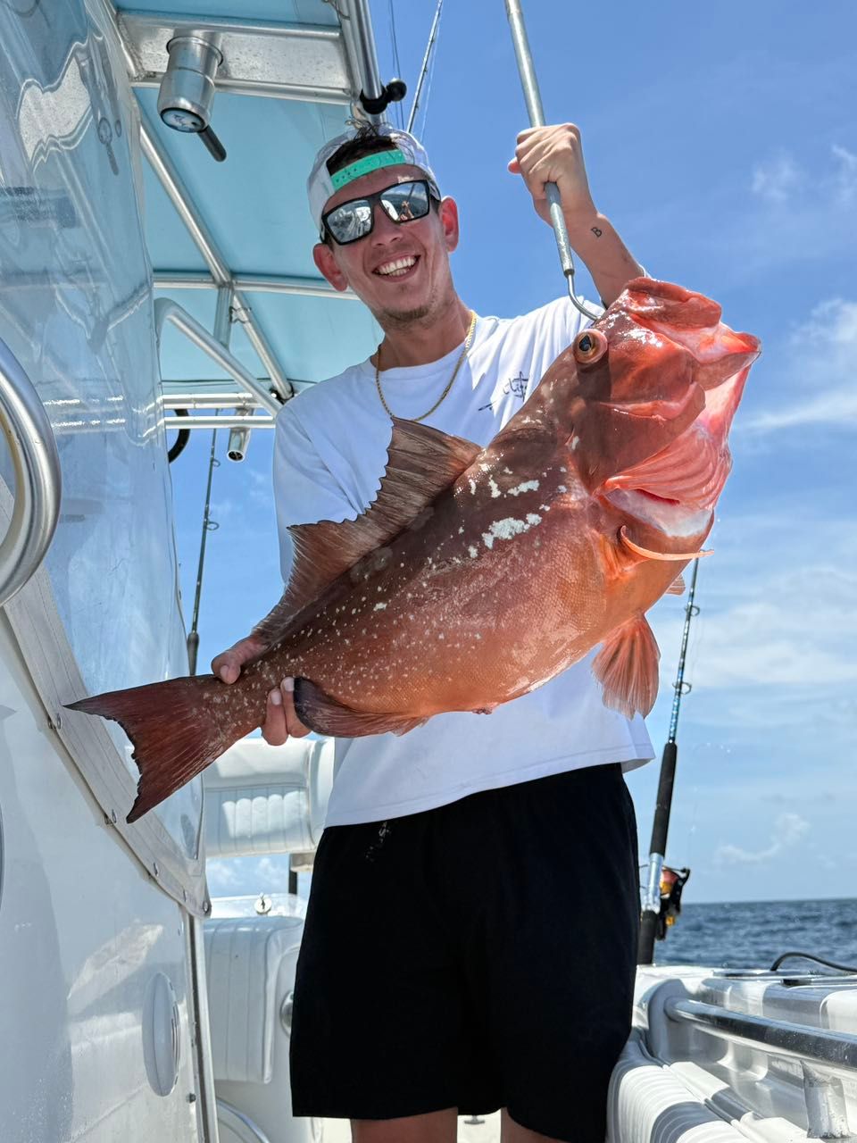 Lone angler fishing at unknown location