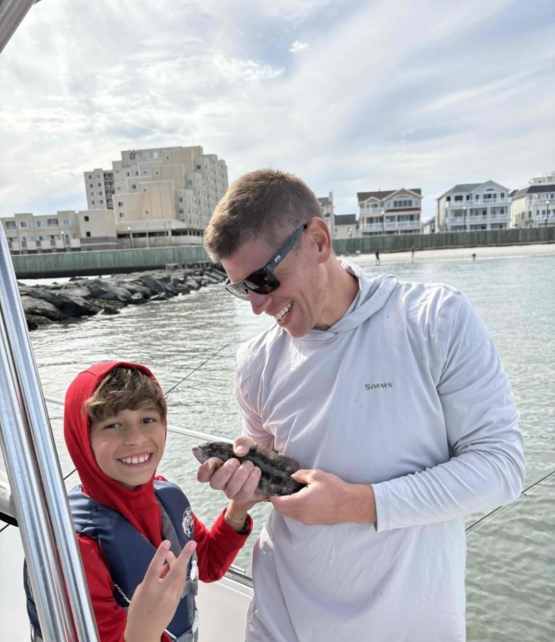 Two anglers fishing in unspecified location