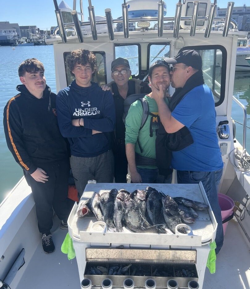 Fishing boat with fresh caught fish displayed in cooler on deck