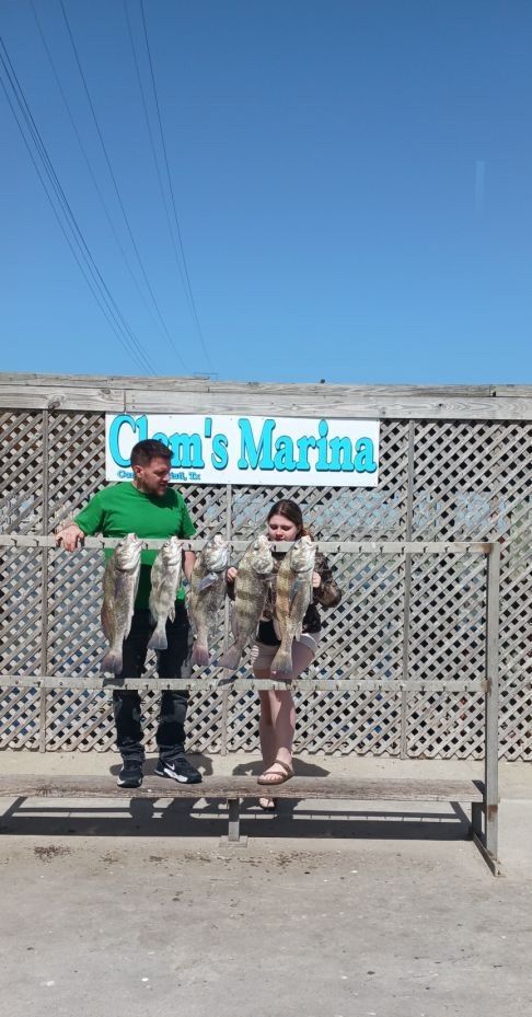 Two anglers fishing for sheepshead