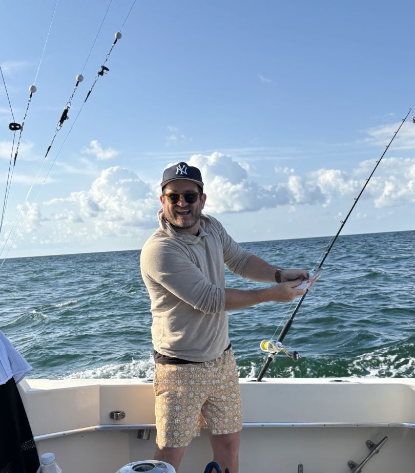 Person fishing at unknown location