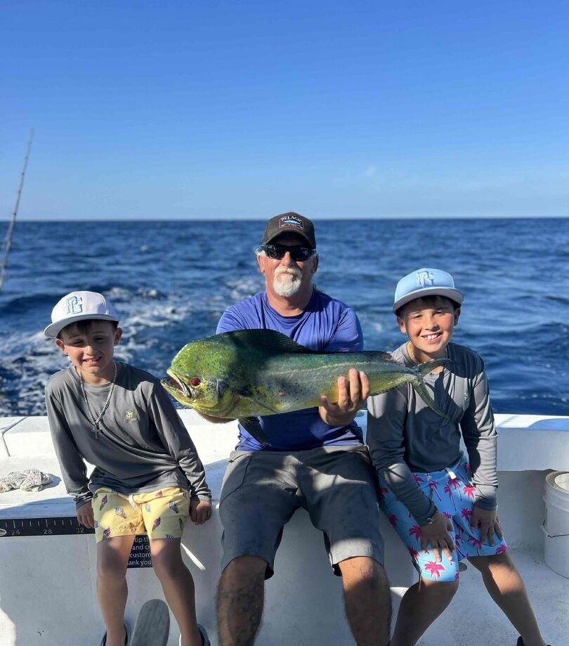 Trio of anglers enjoying a successful fishing trip