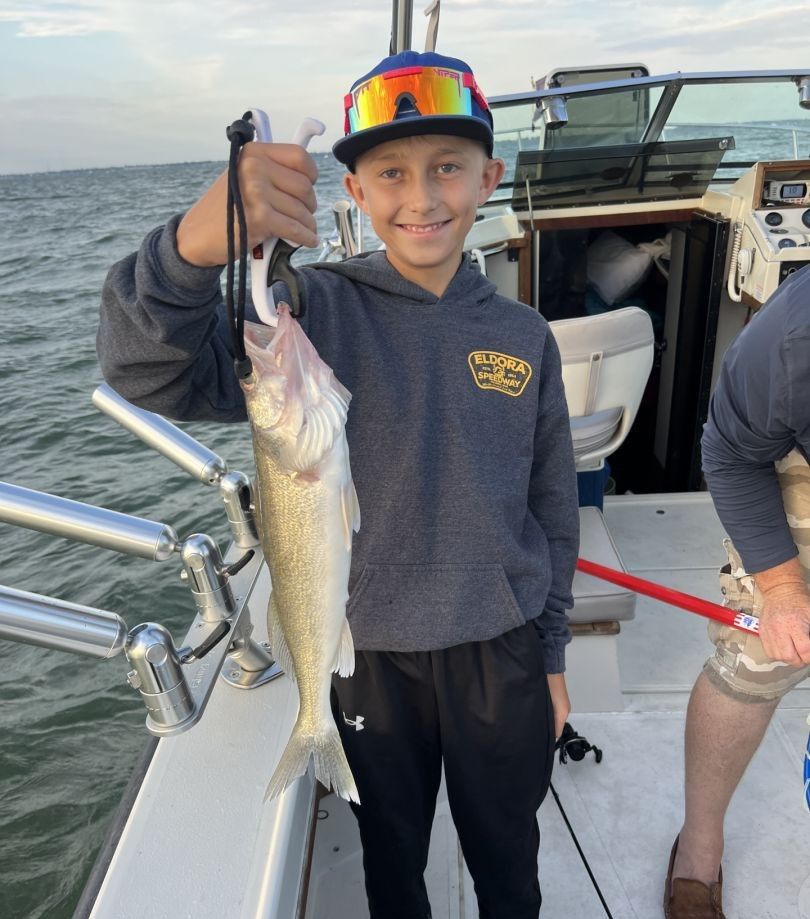 Freshly caught walleye being displayed on fishing boat deck