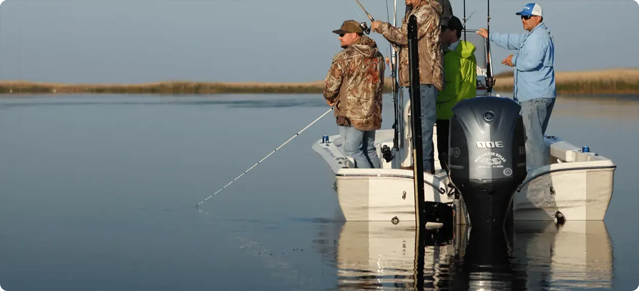 Three people fishing in an unknown location